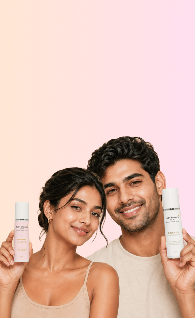 Smiling couple holding Silky Smooth Skin Vitamin C serum and Collagen serum against a soft pink gradient background.